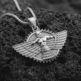 Load image into Gallery viewer, A polished silver Faravahar pendant is displayed on black volcanic rock in a premium macro studio close-up with sharp wing details and ancient symbolic texture.
