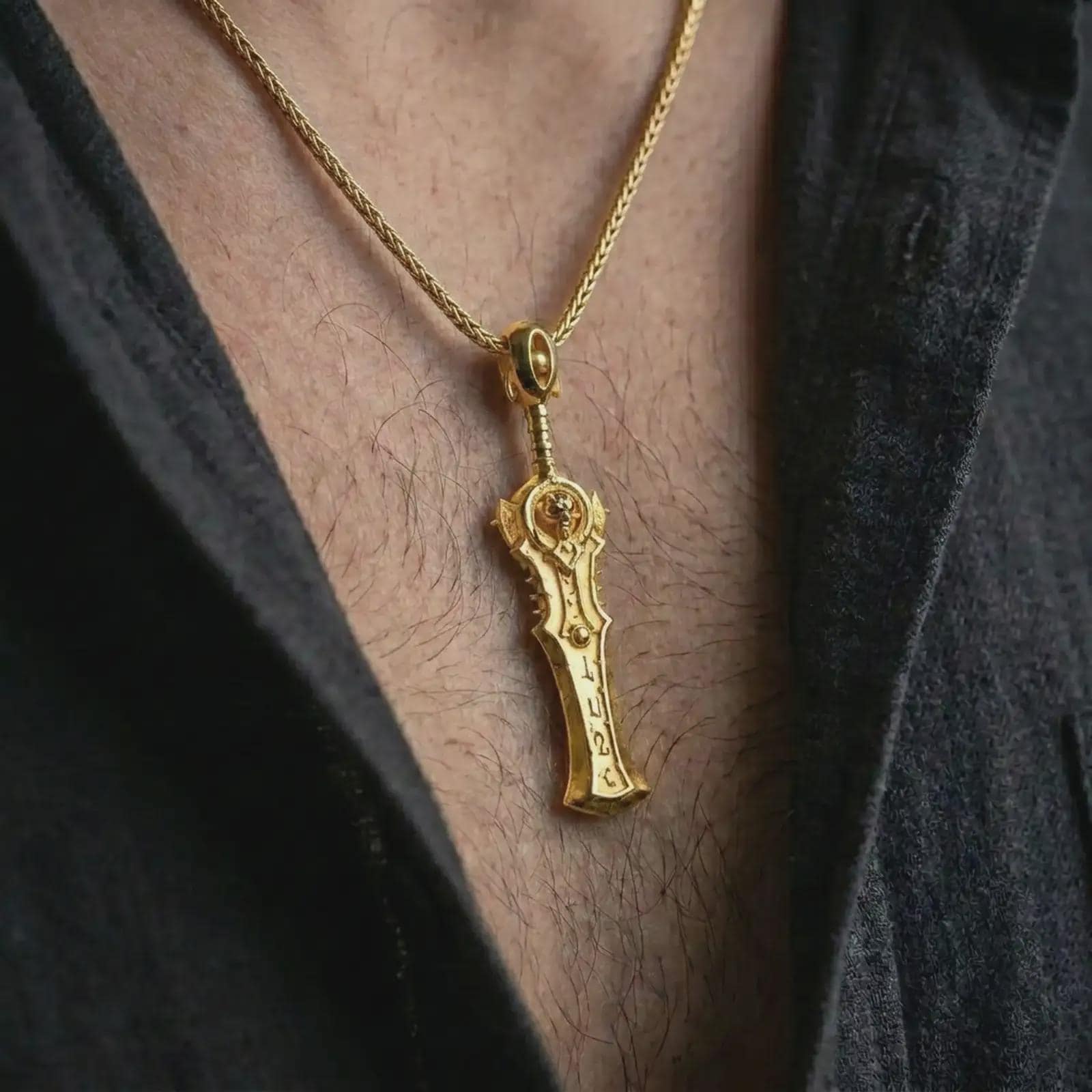 A gold plated demon slayer sword pendant is worn on the neck in a close-up lifestyle shot, styled as a powerful gaming-inspired gift for men.
