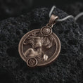 Load image into Gallery viewer, Bronze Virgo zodiac pendant necklace on textured volcanic rock, close-up studio shot highlighting the elegant woman relief, flowing hair, sun detail, and antique silver contrast.
