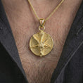 Load image into Gallery viewer, Gold plated goat pentagram pendant necklace worn on the chest, premium lifestyle jewelry photo with the occult goat pendant centered on a spiga chain.
