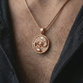 Load image into Gallery viewer, Rose gold plated koi fish lotus pendant necklace worn on the chest, close-up lifestyle shot featuring the peaceful yin yang koi design with warm rose gold tones.
