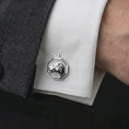 Load image into Gallery viewer, A polished silver lioness head cufflink is worn on a shirt cuff in a premium close-up lifestyle image, showing the sculpted lioness profile clearly.
