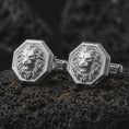 Load image into Gallery viewer, Polished silver lion head cufflinks are displayed on black volcanic rock in a premium macro studio close-up with sharp facial texture and clean geometric edges.
