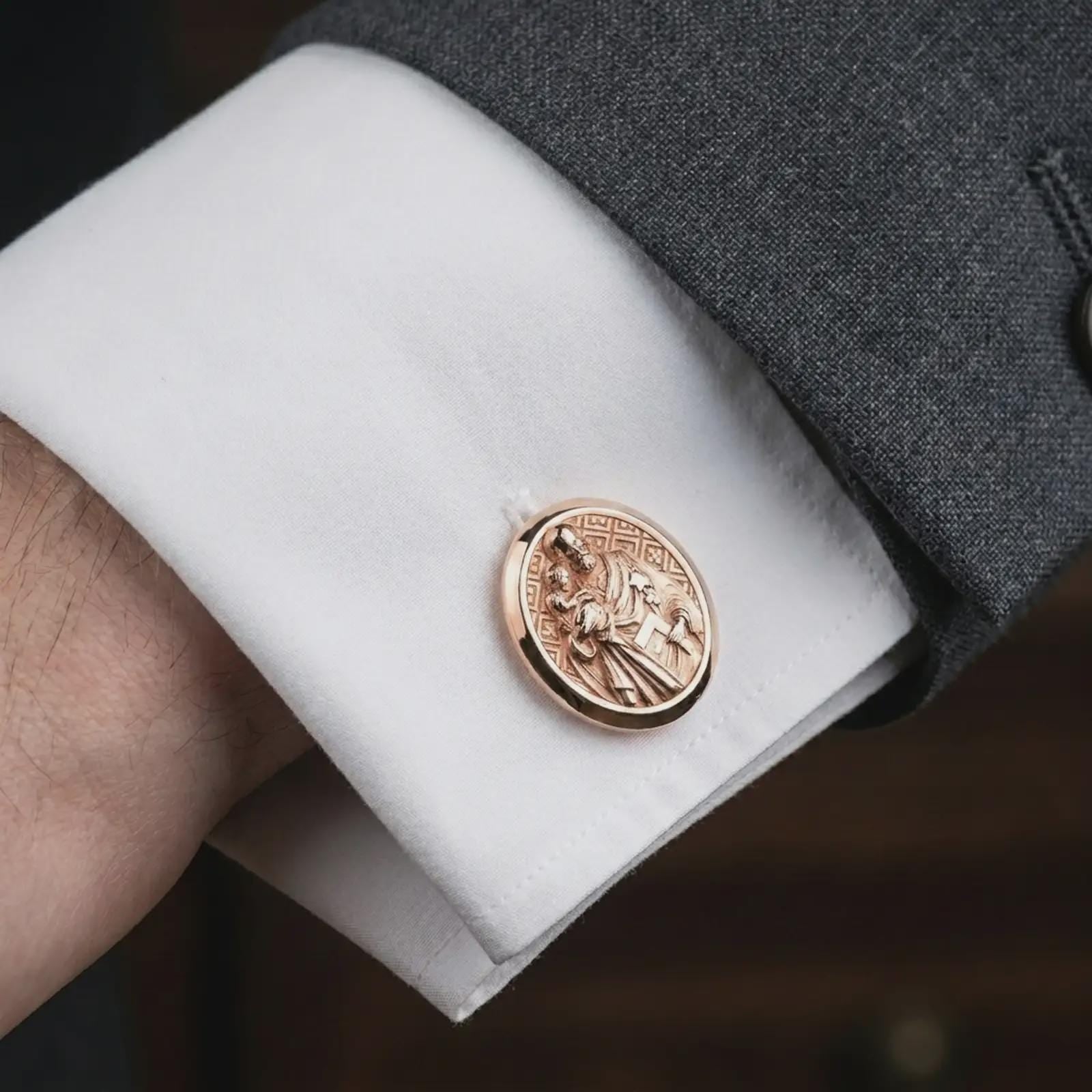 Rose gold plated Saint Joseph cufflinks featured on a formal dress shirt cuff in a luxury lifestyle close-up, displaying the Saint Joseph and Christ Child relief with elegant craftsmanship.