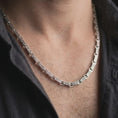 Load image into Gallery viewer, Polished silver Greek key chain necklace is worn on the neck in a premium close-up lifestyle image, showing the clean Byzantine-inspired link structure.
