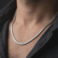 Load image into Gallery viewer, Oxidized silver snake chain worn close to the neck on a male model, styled as a sleek everyday men’s necklace.
