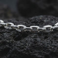 Load image into Gallery viewer, Polished silver mariner chain necklace on volcanic stone, highlighting the rounded links and nautical-inspired design.
