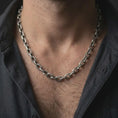 Load image into Gallery viewer, Oxidized silver anchor chain worn by a male model, styled as a masculine nautical necklace for everyday use.

