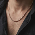 Load image into Gallery viewer, Rose gold plated box chain worn on a male model, highlighting its compact links, warm finish, and refined minimal character.
