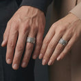 Load image into Gallery viewer, The polished silver dragon claw band is worn on a couple’s fingers, showing the detailed reptilian texture and substantial unisex proportions in a premium lifestyle close-up.
