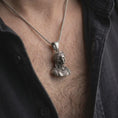 Load image into Gallery viewer, Oxidized architectural bust pendant worn on neck in close-up lifestyle shot
