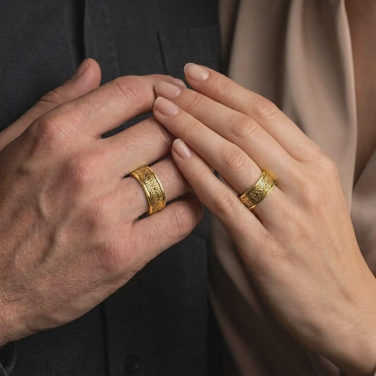 A gold plated Celtic knot ring is worn on a hand, emphasizing the symbolic interwoven pattern, wide spinning band form, and meaningful Irish-inspired jewelry design.