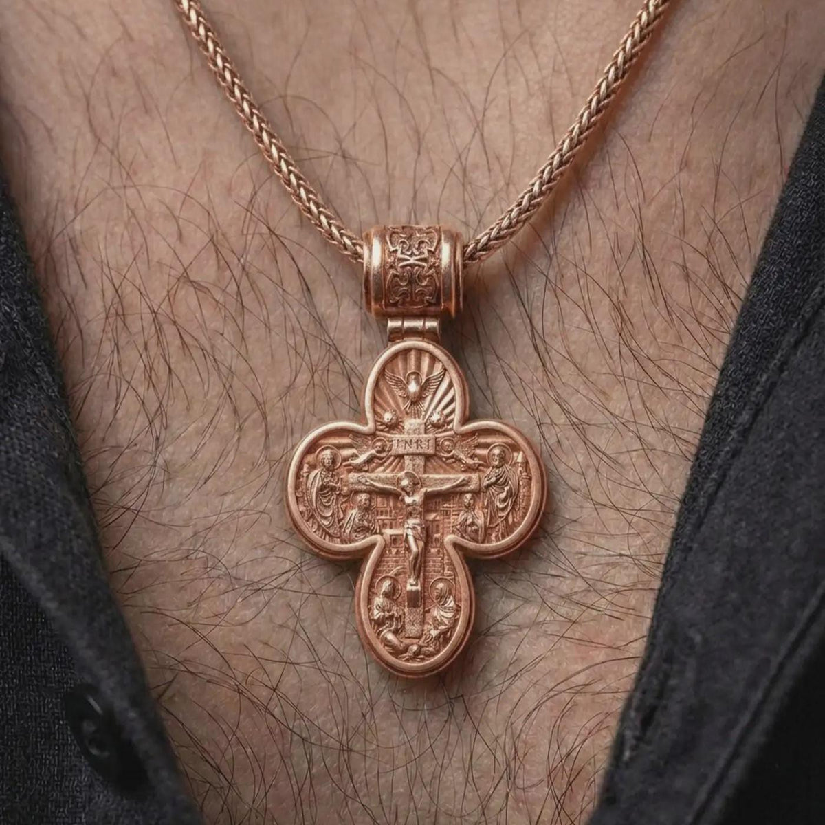 The rose gold plated Saint Michael necklace is worn on the neck, showcasing the detailed double sided cross pendant, decorative bail, and bold faith-inspired jewelry design in an elegant lifestyle image.