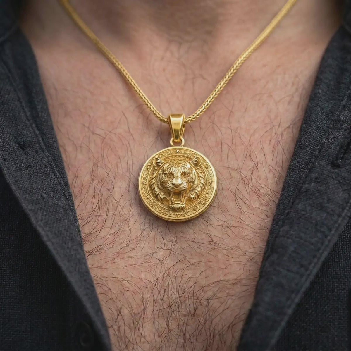 Gold plated tiger head necklace worn on the chest, highlighting the roaring expression, powerful fangs, detailed striped face, and bold men's statement jewelry design.