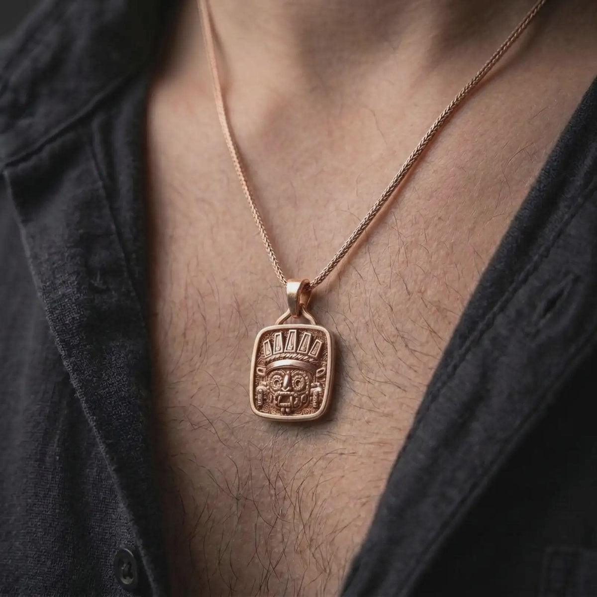 Rose gold plated Tlaloc pendant worn on the chest, showcasing the Mexica rain deity, ornate headdress, goggle eyes, fangs, and ancient Mesoamerican-inspired details.