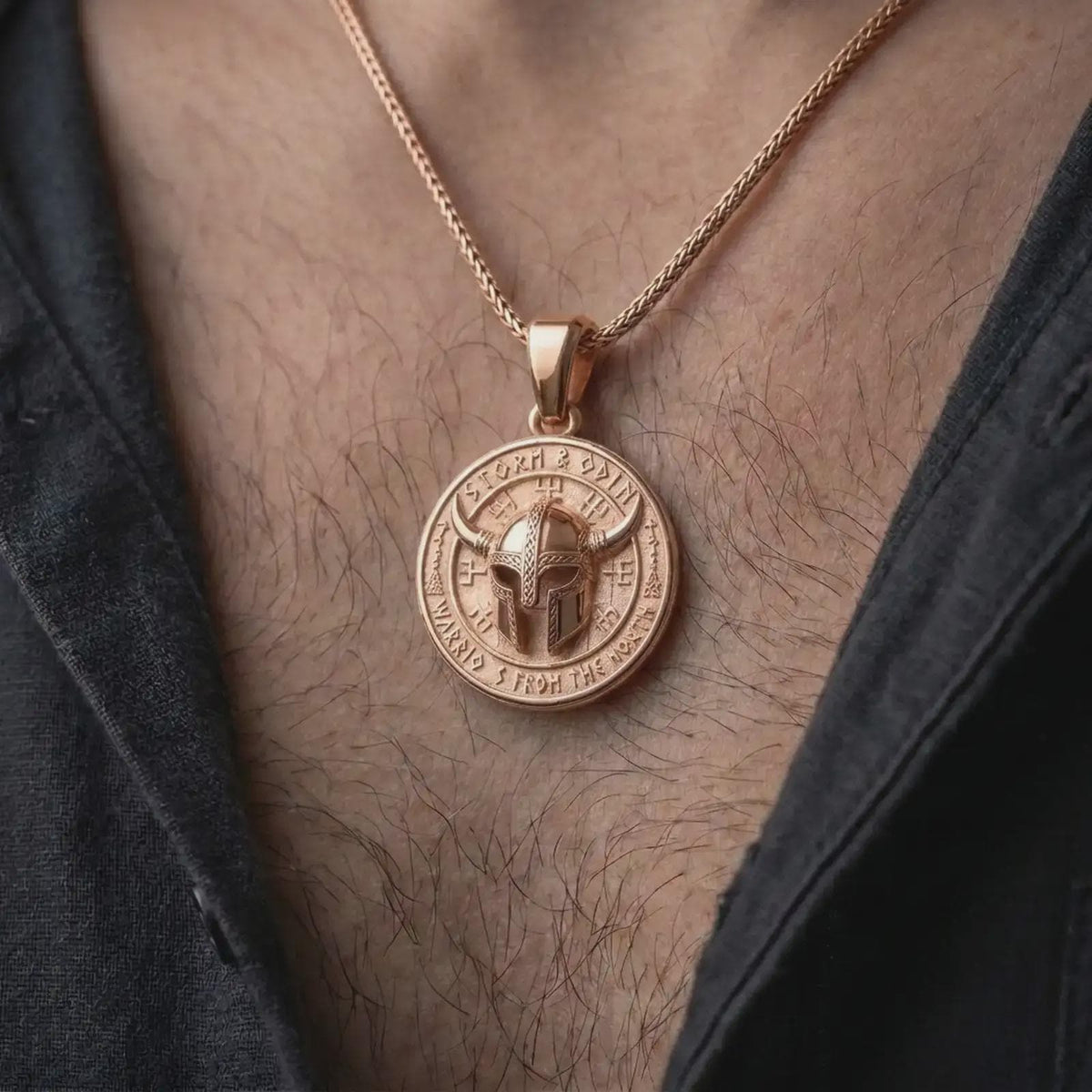 Rose gold plated Viking helmet necklace worn on the chest, showcasing the Odin-inspired warrior motif, engraved rune symbols, detailed helmet, and Norse statement jewelry style.