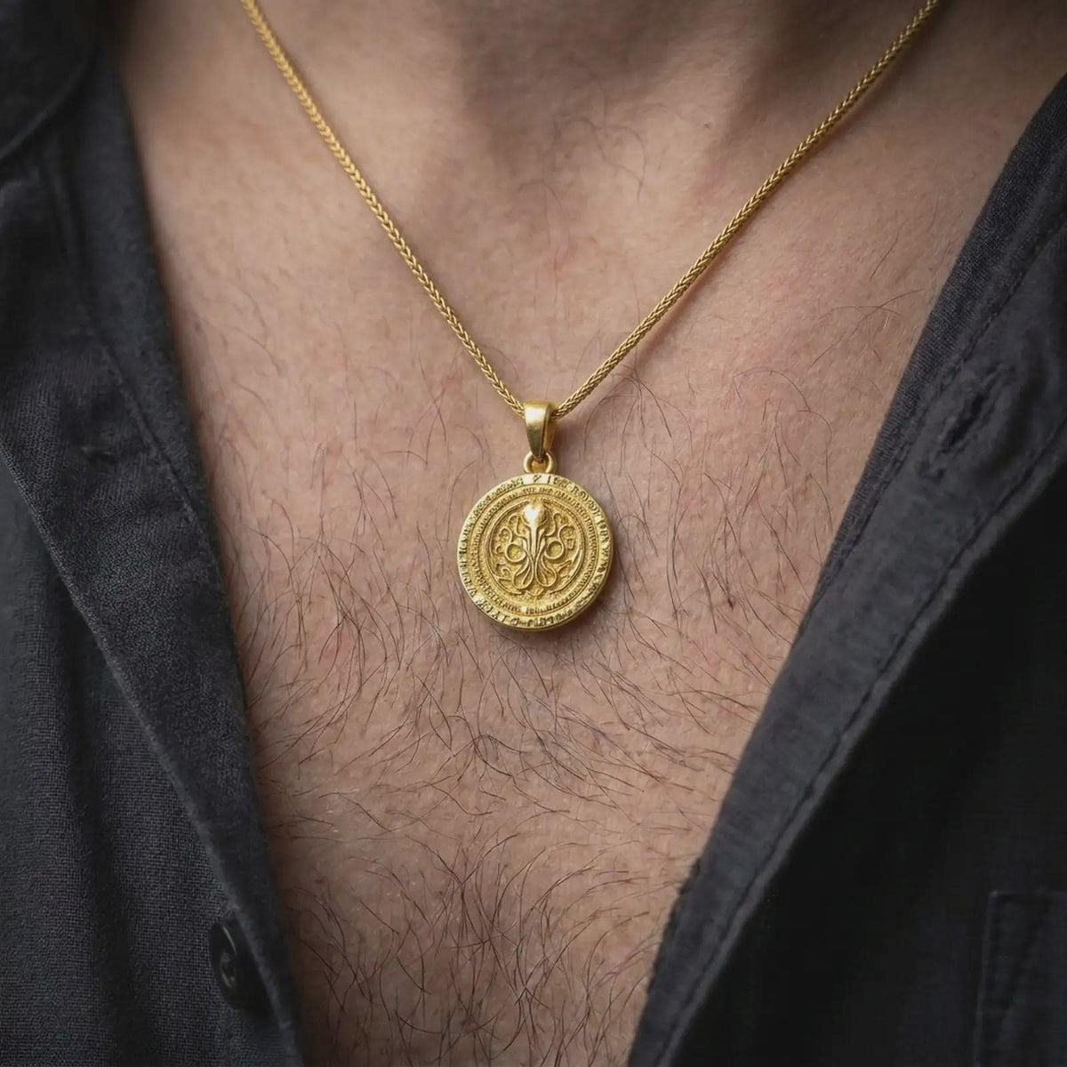 Gold plated eldritch horror necklace worn on the chest, highlighting the round pendant, raised octopus sigil centerpiece, and bold cosmic horror inspired design.