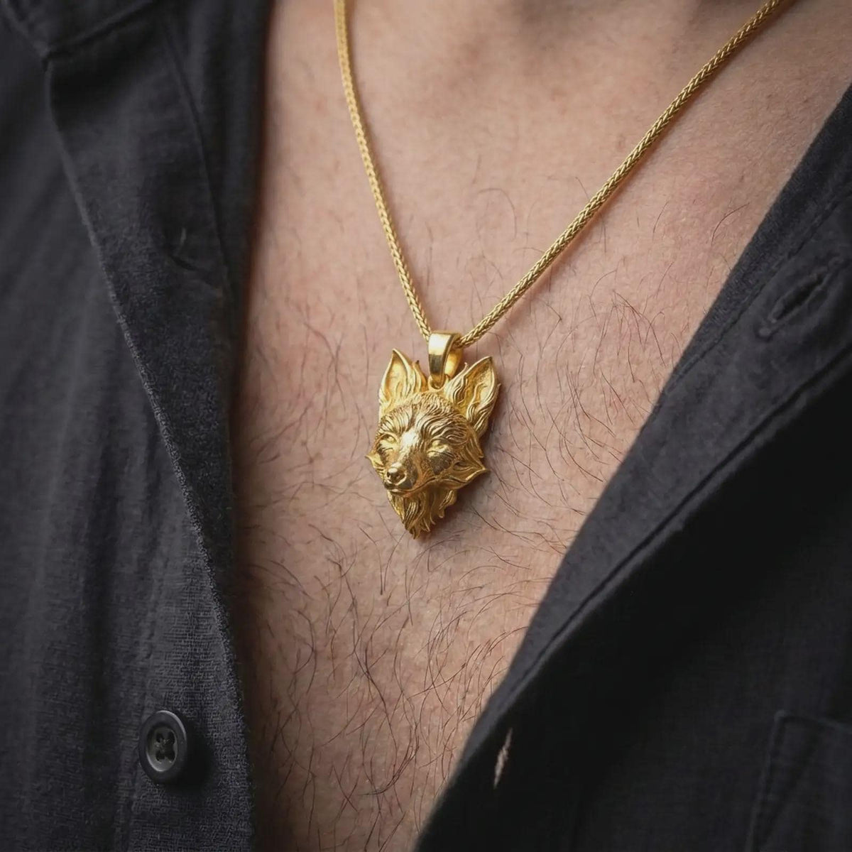 Gold plated fox necklace worn on the chest, highlighting the pointed ears, expressive eyes, textured fur, and bold fox lover jewelry aesthetic.