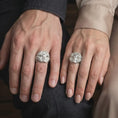 Load image into Gallery viewer, Polished silver Freemason eagle skull ring worn on the hand, featuring the sculpted skull centerpiece, detailed Masonic forehead emblem, layered feather relief, and bold gothic statement ring profile.
