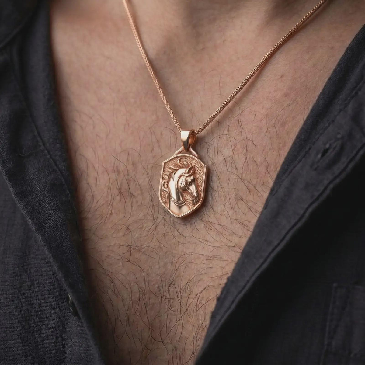 Rose gold plated horse necklace worn on the chest, showcasing the three-dimensional equestrian horse portrait, beautifully detailed mane, expressive facial features, ornamental bridle, and bold shield-shaped animal pendant.