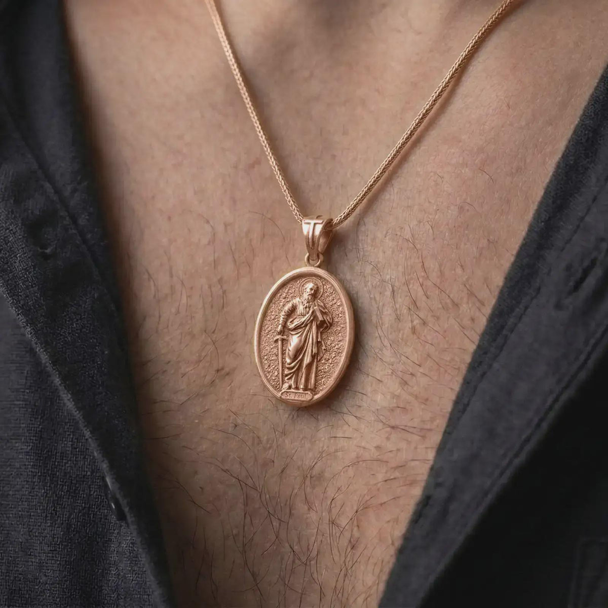 Rose Gold Plated Saint Paul Apostle necklace displayed on a man's chest, emphasizing the traditional saint figure and cross-decorated bail.