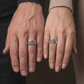 Load image into Gallery viewer, Polished 925 sterling silver matching Masonic rings worn on the fingers of a man and woman together, showcasing detailed symmetrical hands, raised square and compass symbols, central G letters, and matching bright polished silver finishes.
