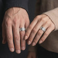 Load image into Gallery viewer, Polished Silver Viking-inspired rings worn by a man and woman together, highlighting the wide bands and intricate Asanoha patterns.
